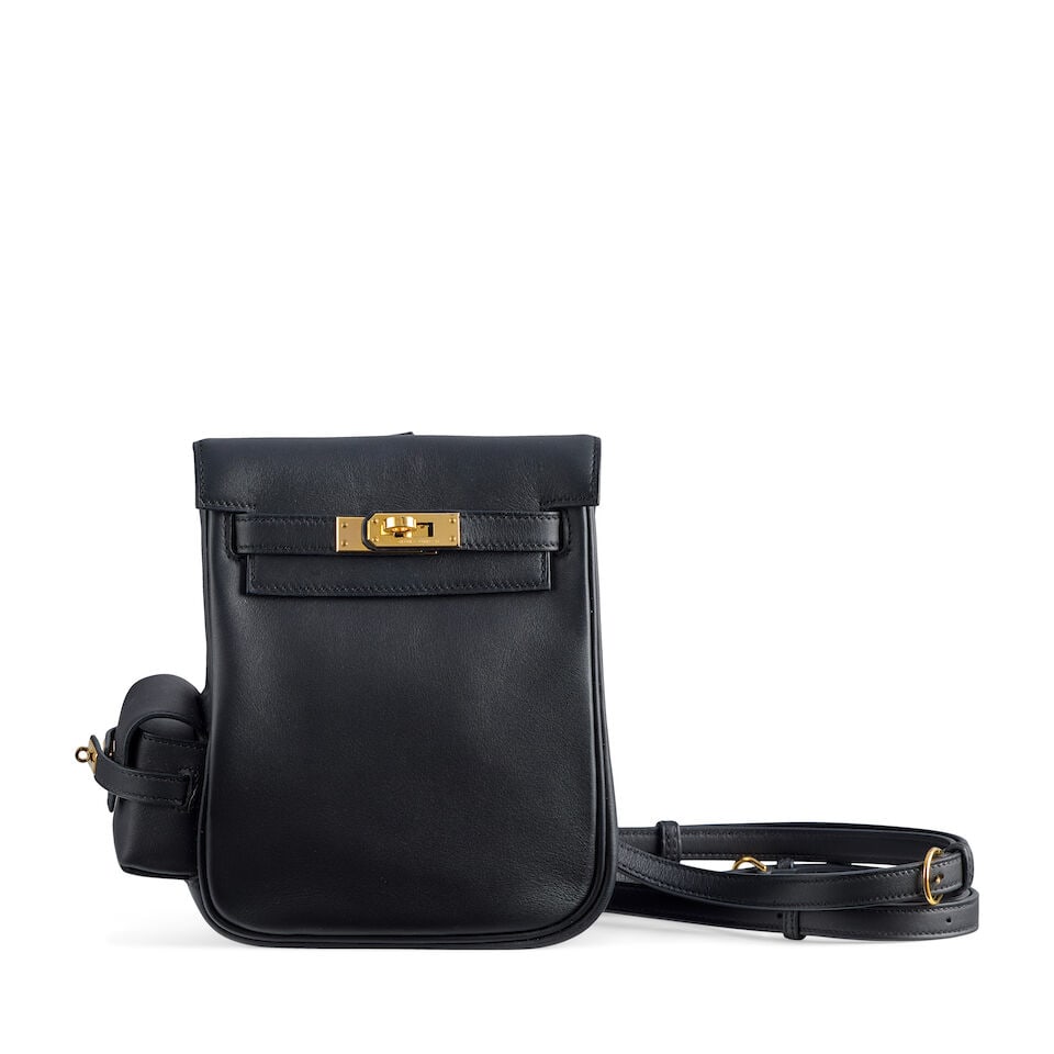 Hermès: a Black Swift Leather Kelly Jump 2025 (includes felt protector, dust bag, copy of r...: Hermès: a Black Swift Leather Kelly Jump 2025 Gold tone hardware Condition Grade B+ 15cm wide, 19cm high, 7cm deep, pocket 6.5cm wide, 6cm high, 3cm deep, includes felt protector, dust bag, copy