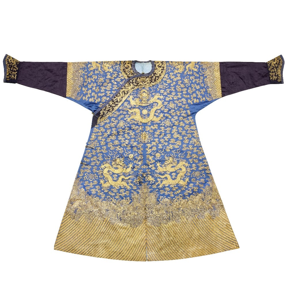 AN IMPERIAL GOLD AND SILVER-EMBROIDERED BLUE-GROUND 'DRAGON' ROBE, JIFU Jiaqing: AN IMPERIAL GOLD AND SILVER-EMBROIDERED BLUE-GROUND 'DRAGON' ROBE, JIFU Jiaqing Worked in couched-gold and silver threads with nine writhing dragons chasing flaming pearls amidst dense ruyi clouds, in