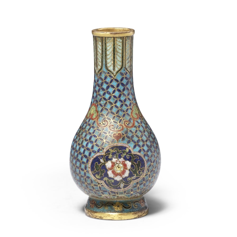 A RARE SMALL CLOISONNÉ ENAMEL 'BROCADE GROUND AND LOTUS' VASE Qianlong four-character and a...: A RARE SMALL CLOISONNÉ ENAMEL 'BROCADE GROUND AND LOTUS' VASE Qianlong four-character and additional 'Ren' mark and of the period The pear-shaped vase rising from a spreading foot with floral scr