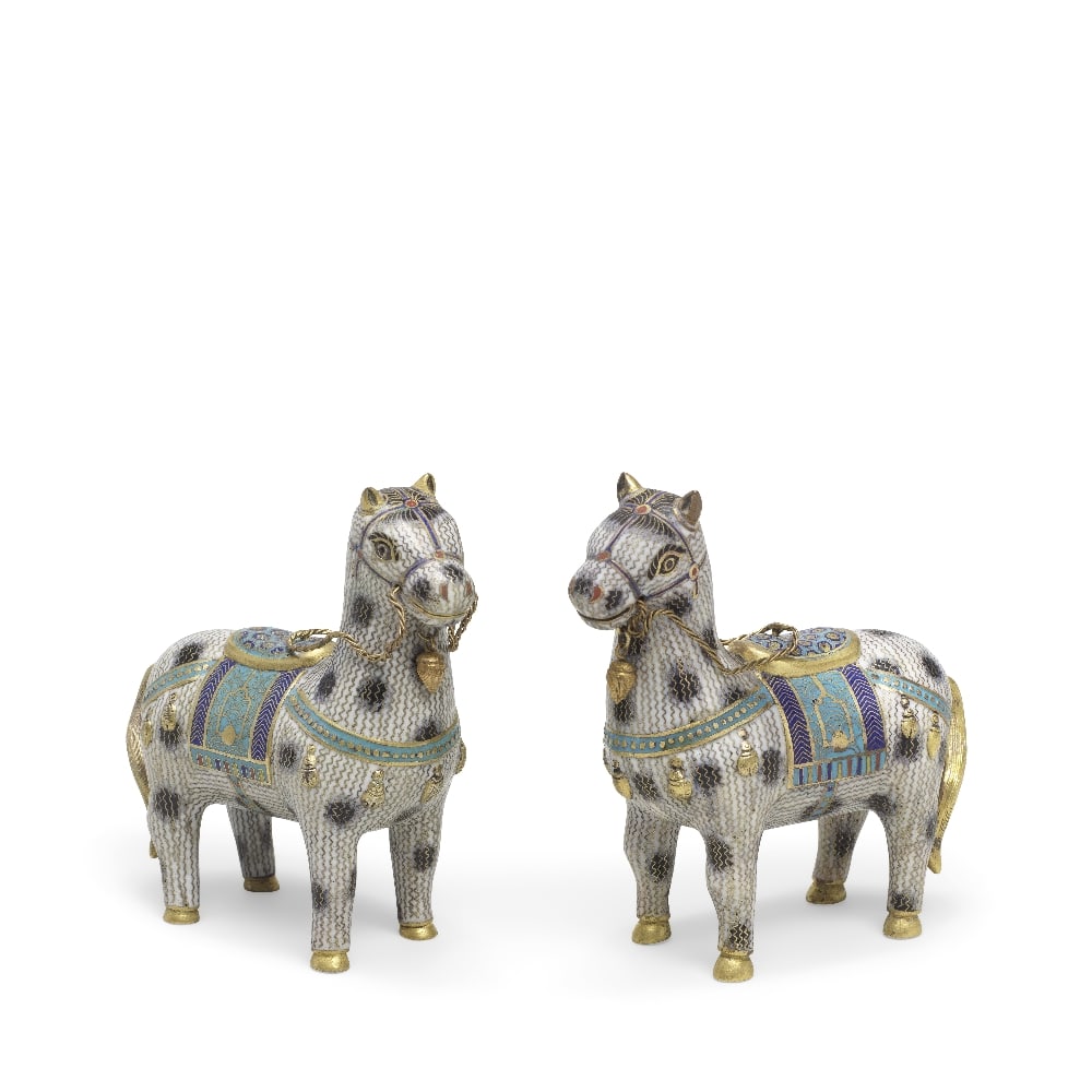 A RARE PAIR OF CLOISONNÉ ENAMEL FIGURES OF HORSES Qianlong (2): A RARE PAIR OF CLOISONNÉ ENAMEL FIGURES OF HORSES Qianlong Each exquisitely cast standing foursquare, the robust bodies crisply modelled and evenly balanced, covered overall in a luminous white e