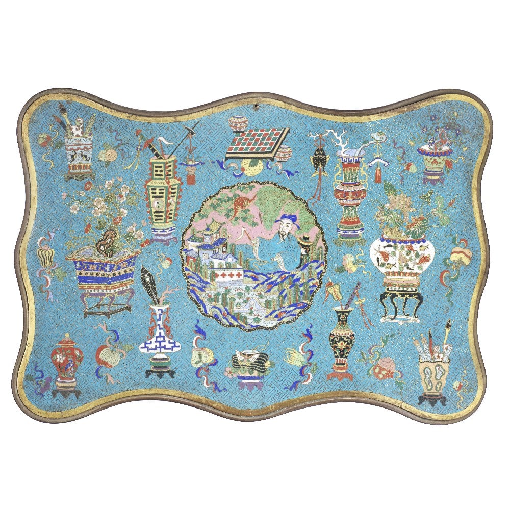 A CLOISONNÉ ENAMEL 'HUNDRED ANTIQUES AND SCHOLAR' PANEL 19th century: A CLOISONNÉ ENAMEL 'HUNDRED ANTIQUES AND SCHOLAR' PANEL 19th century The shaped panel decorated with a central roundel containing a scholar with a fly-whisk resting against a large vase, seated b
