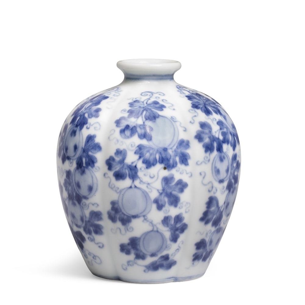 A RARE BLUE AND WHITE 'MELON' JAR Yongzheng six-character mark and of the period: A RARE BLUE AND WHITE 'MELON' JAR Yongzheng six-character mark and of the period Elegantly potted with six tapering lobes surmounted by a narrow flaring mouth and meticulously painted around the exter