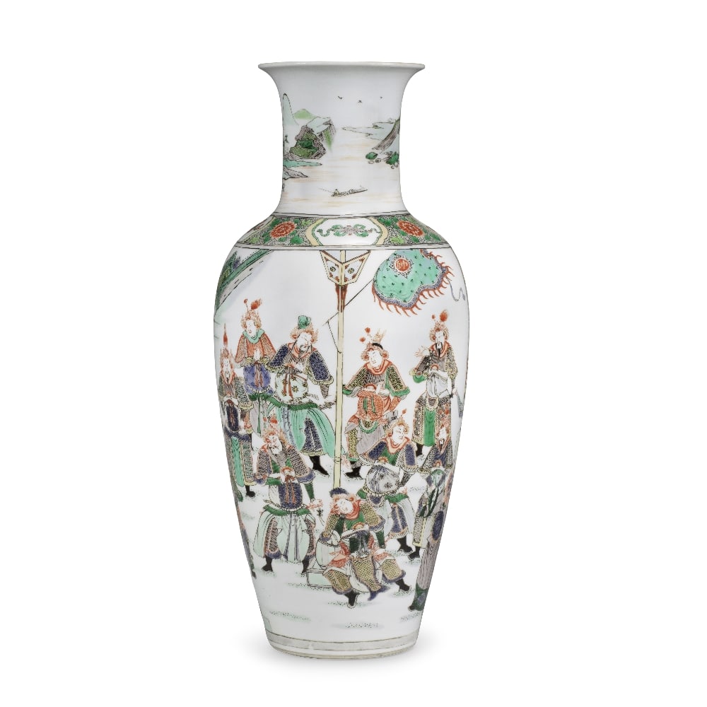 A FAMILLE VERTE 'ROMANCE OF THE THREE KINGDOMS' VASE Kangxi: A FAMILLE VERTE 'ROMANCE OF THE THREE KINGDOMS' VASE Kangxi Of elegant baluster form with flaring cylindrical mouth, vibrantly enamelled around the exterior with a scene of an emperor on a terrace cla