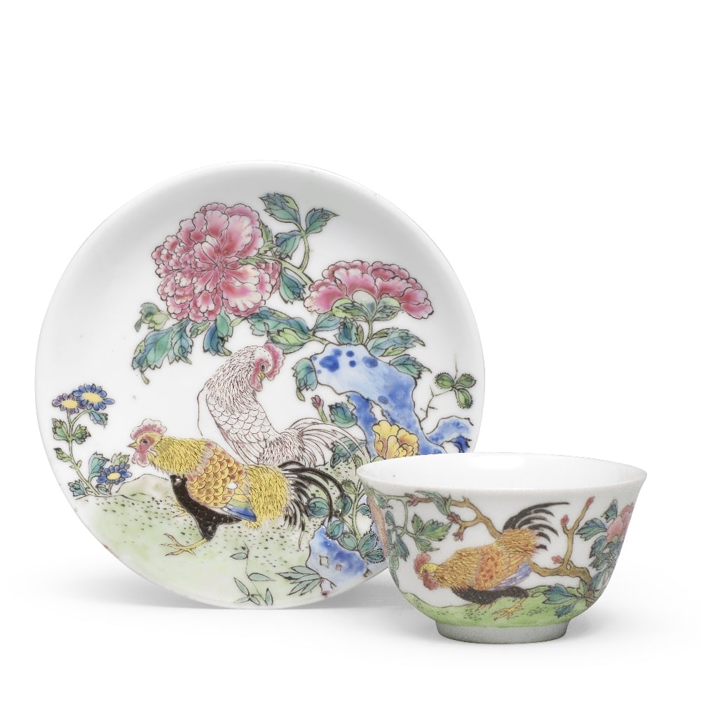 A FAMILLE ROSE 'COCKERELS' CUP AND SAUCER Yongzheng (4): A FAMILLE ROSE 'COCKERELS' CUP AND SAUCER Yongzheng The cup thinly potted with deep curving sides rising from a short foot to a slightly everted rim, decorated in bright enamels around the exterior wi