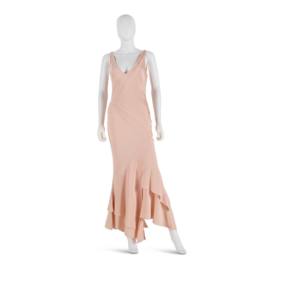 CHRISTIAN DIOR: PINK INSET BIAS CUT GOWN Spring 2005 | John Galliano: CHRISTIAN DIOR: PINK INSET BIAS CUT GOWN Spring 2005 | John Galliano • Size 40 • Viscose Blend | 100% Silk Lining • Button Closure and shawl Included For further information on this 