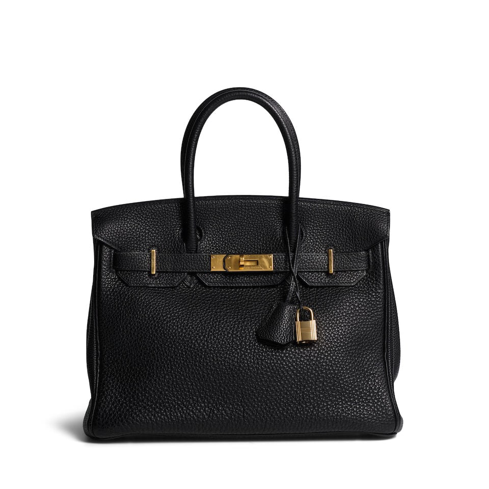 HERMÈS: NOIR TOGO BIRKIN 30 2005: HERMÈS: NOIR TOGO BIRKIN 30 2005 • Black Togo Exterior • Gold Tone Hardware and Protective Feet at Base • Dual Rolled Handles • Chevre Lining • Open Interior Patch P