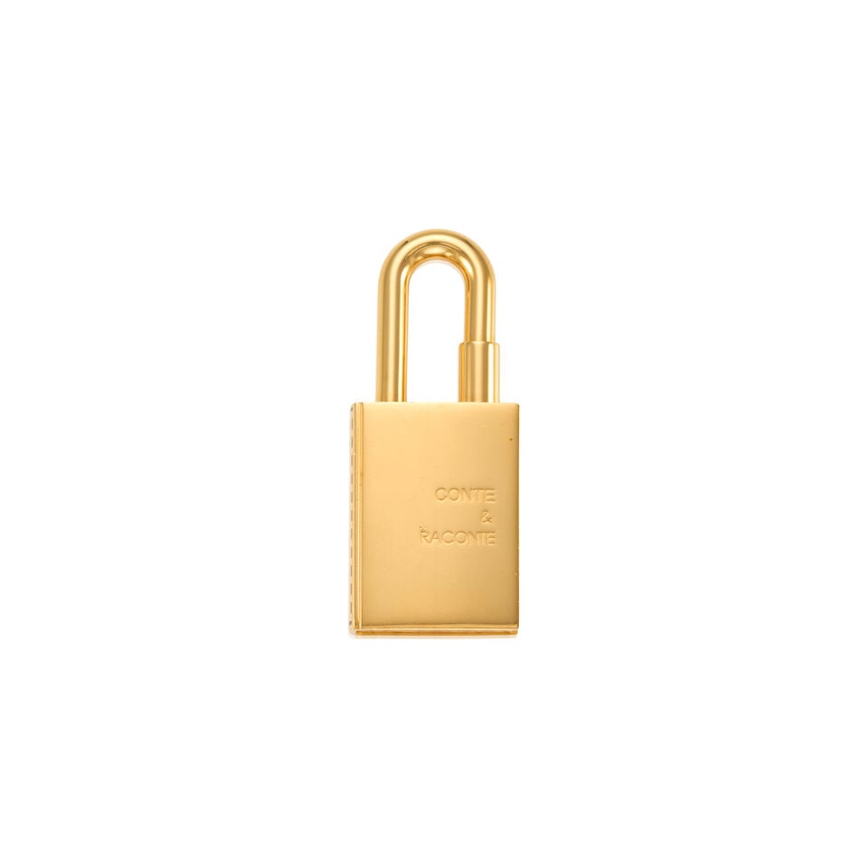 HERMÈS: GOLD CONTE RACONTE BOOK CADENA LOCK CHARM 2010 | Tales and Stories Collection (1 of 2)