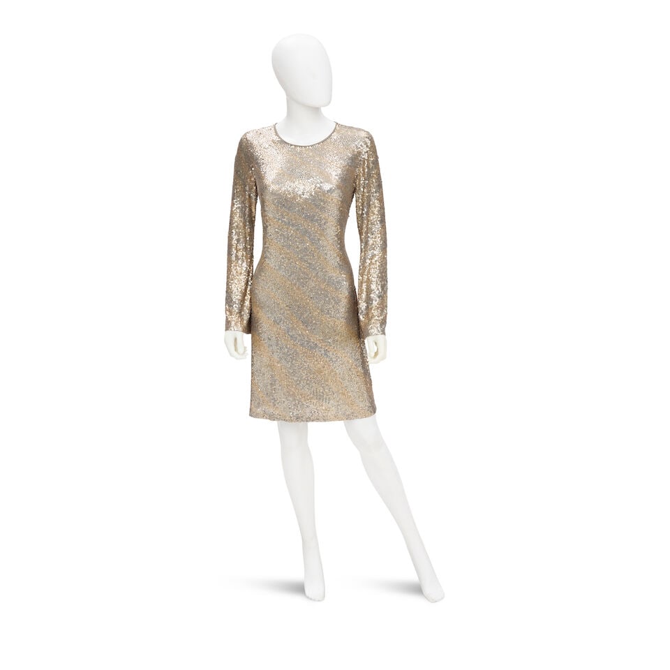 NAEEM KAHN: METALLIC SEQUIN ZEBRA PRINT MINI DRESS: NAEEM KAHN: METALLIC SEQUIN ZEBRA PRINT MINI DRESS • Marked Size 8 • Bronze and Silver Sequins Laid on 100% Silk Material Exterior • Zip Closure For further information on this lot p