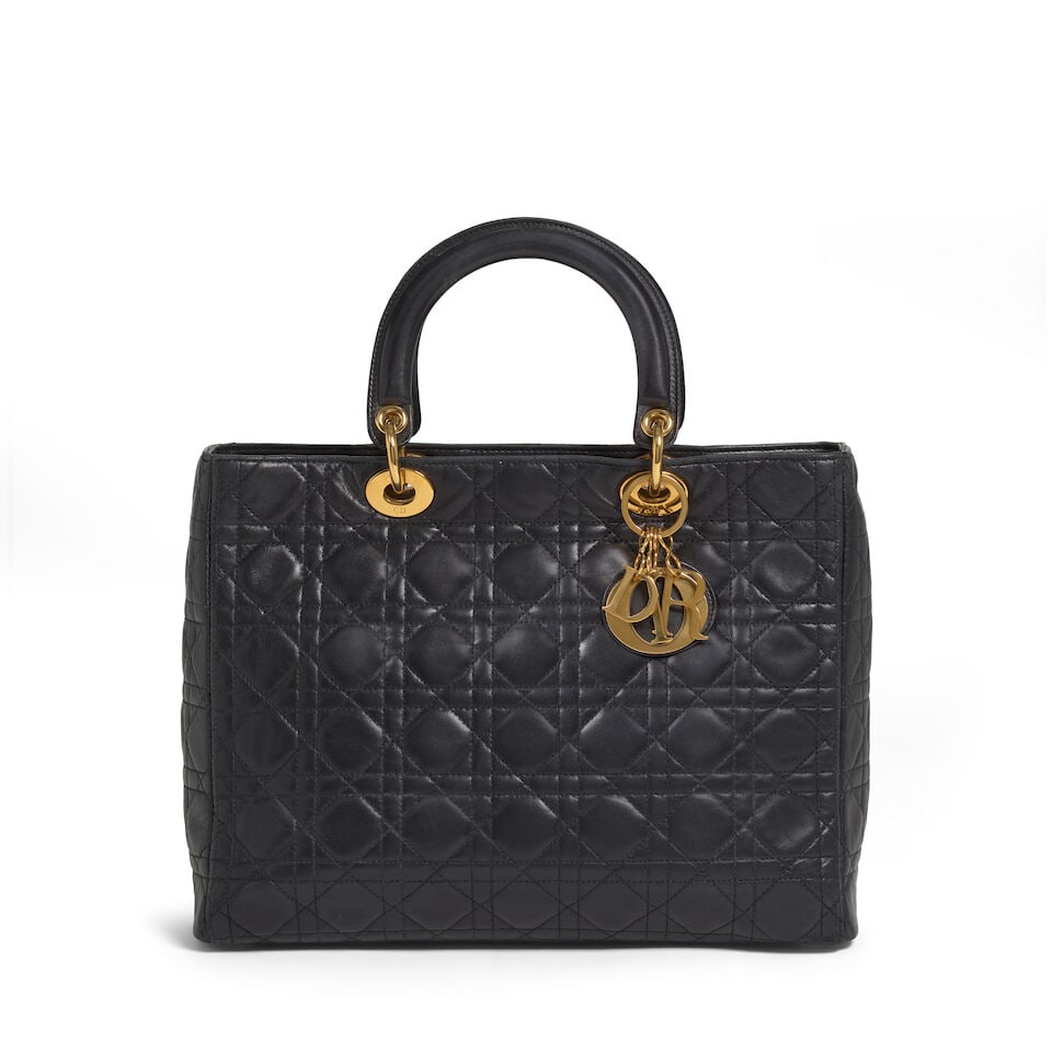 CHRISTIAN DIOR: BLACK CANNAGE LEATHER LARGE LADY DIOR 1995-1997: CHRISTIAN DIOR: BLACK CANNAGE LEATHER LARGE LADY DIOR 1995-1997 • Black Lambskin Cannage Quilted Exterior • Gold Tone Hardware and Protective Feet at Base • Zip Closure • Dual 