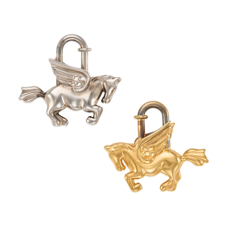 HERMÈS: A GROUP OF TWO LE CHEVAL PEGASUS CADENA LOCK CHARMS 1993 (1 of 1)