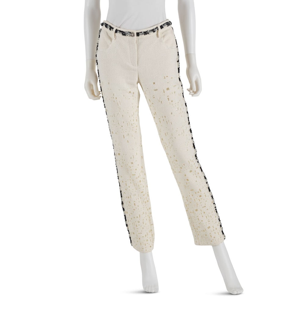 CHANEL: WHITE TWEED CUTOUT TROUSERS Spring 2007 | Look 7: CHANEL: WHITE TWEED CUTOUT TROUSERS Spring 2007 | Look 7 • Marked Size 38 • White Cotton Blend Exterior with Navy Tweed Trim and Cutout Detail Throughout • Button and Zip Closure 