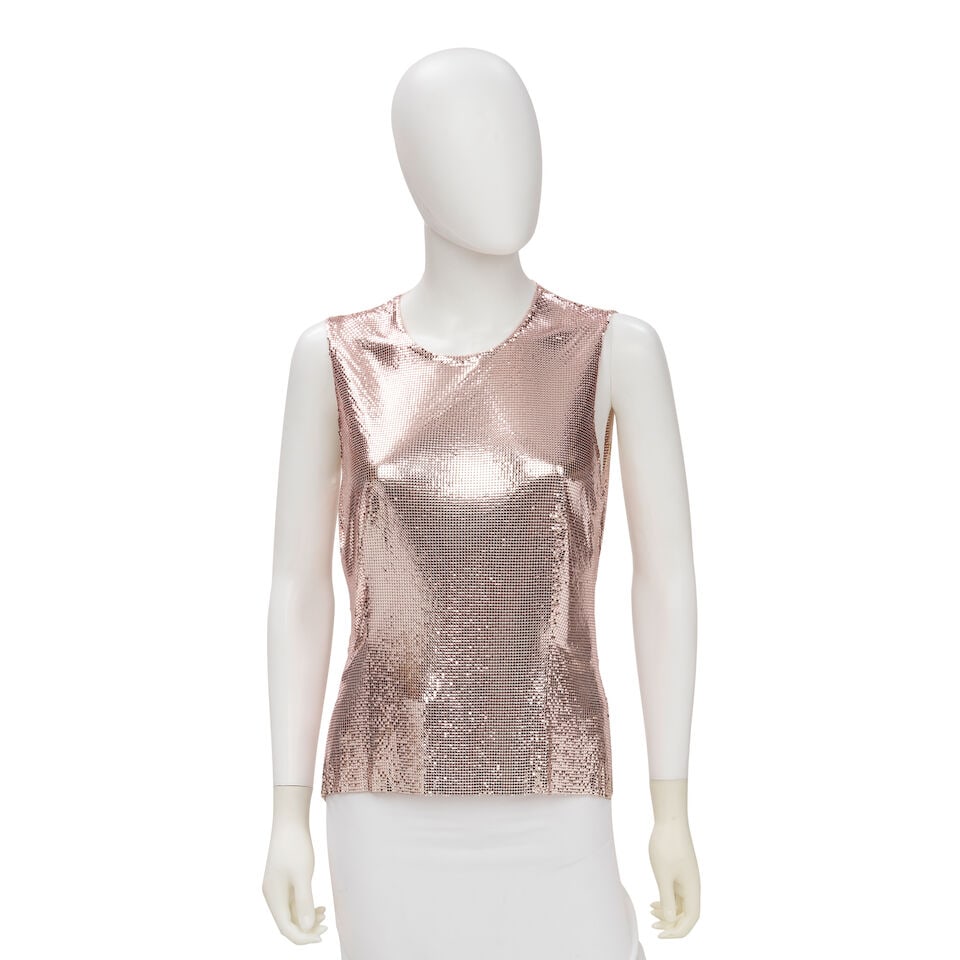 GIANNI VERSACE COUTURE: PALE PINK CHAINMAIL TOP Fall 1994: GIANNI VERSACE COUTURE: PALE PINK CHAINMAIL TOP Fall 1994 • Marked Size 42 • Pale Pink Metal Exterior • Zipper and Hook and Eye Closure • Unlined For further information on thi