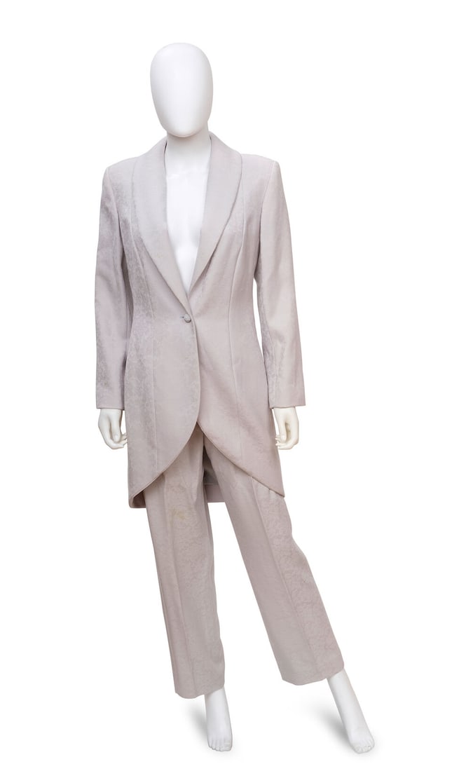 CHRISTIAN DIOR: SLATE BLUE JACQUARD SUIT ENSEMBLE Fall 1998 | John Galliano: CHRISTIAN DIOR: SLATE BLUE JACQUARD SUIT ENSEMBLE Fall 1998 | John Galliano • Marked Size 40 Jacket | Marked Size 44 Trouser • Slate Blue Wool Jacquard Exterior with Skirted Tail Detail