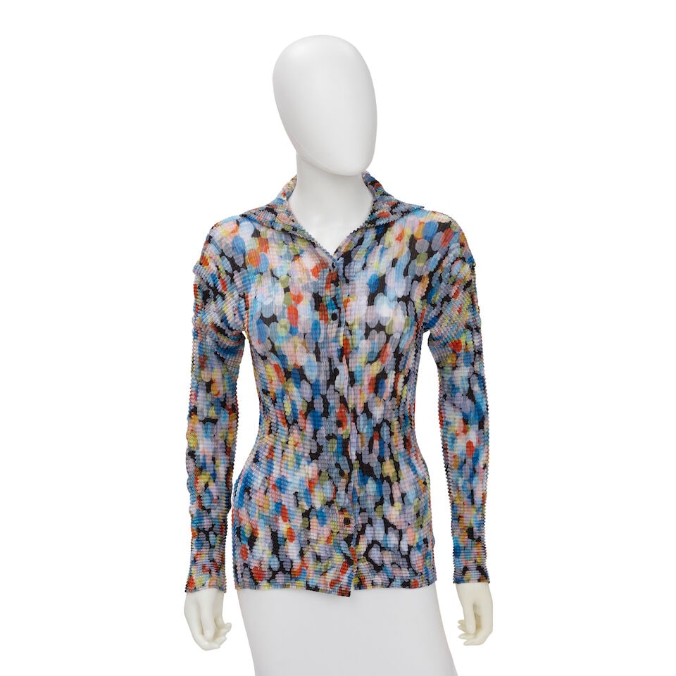 ISSEY MIYAKE FETE: MULTICOLOR PLEAT BUTTON UP BLOUSE 2006: ISSEY MIYAKE FETE: MULTICOLOR PLEAT BUTTON UP BLOUSE 2006 • Marked Size 03 | Fits Like S/M • Multicolor Poly Exterior • Button Closure For further information on this lot please