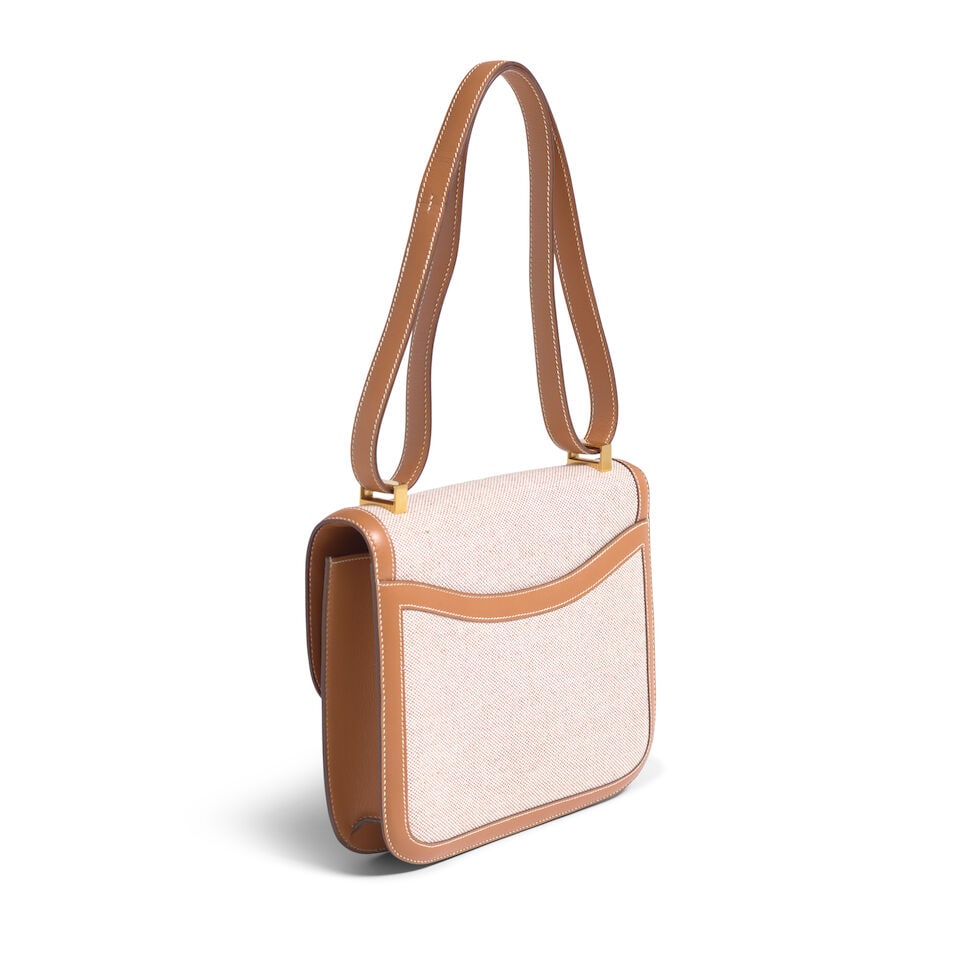 HERMÈS: ECRU TOILE AND GOLD BOX LEATHER CONSTANCE 23 1974 - 2