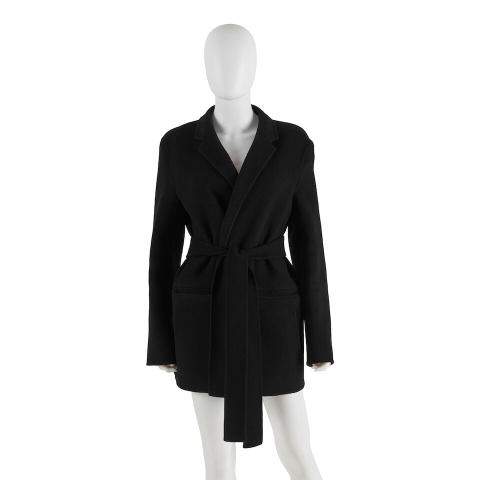 THE ROW: BLACK BELTED BLAZER: THE ROW: BLACK BELTED BLAZER • Marked Size 10 • Black Wool Exterior • Belted Closure For further information on this lot please visit Bonhams.com For further information about this l