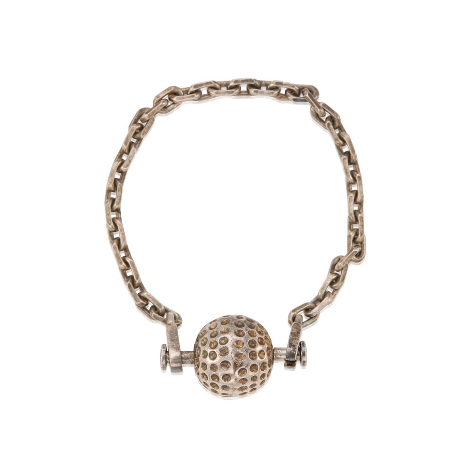 HERMÈS: SILVER GOLF BALL CHARM ON CHAIN: HERMÈS: SILVER GOLF BALL CHARM ON CHAIN • Marked 925 Sterling Silver • Push Lock Closure • Chain Length 12 cm | Charm 1.5 cm x 1.5 cm For further information on this lot please 