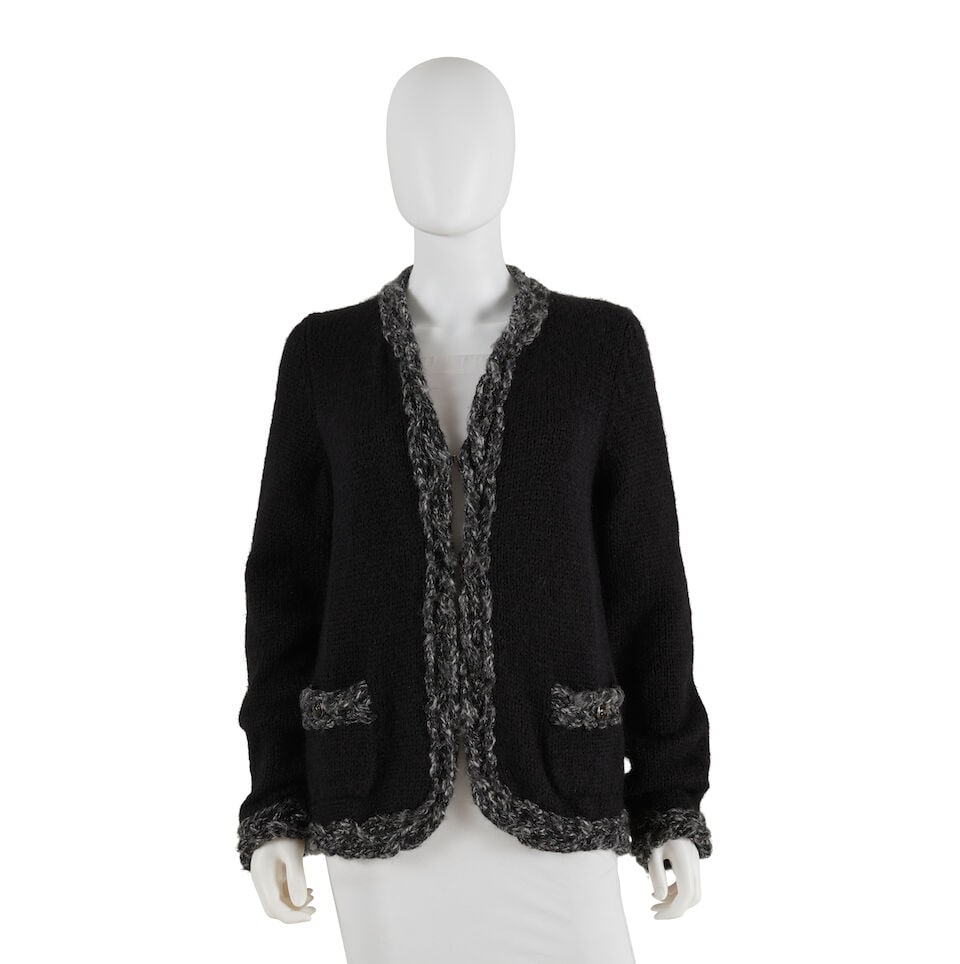 CHANEL: BLACK KNIT BRAIDED TRIM CARDIGAN Fall 2011: CHANEL: BLACK KNIT BRAIDED TRIM CARDIGAN Fall 2011 • Marked Size 40 • Black Cashmere/Alpaca Blend Exterior • Single Hook Closure • Grey Braided Trim at Cuff, Pockets and Hem Fo
