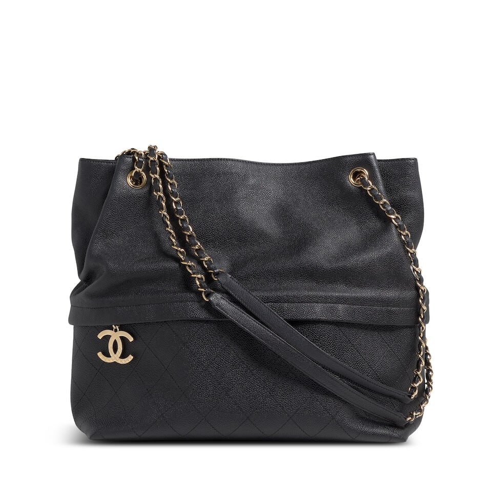 CHANEL: BLACK ZIP AND CARRY TOTE 2017-2018: CHANEL: BLACK ZIP AND CARRY TOTE 2017-2018 • Black Caviar Exterior with Stitch Detail on Base • Gold Tone Hardware and Protective Feet at Base • Snap Closure • Leather and Chai