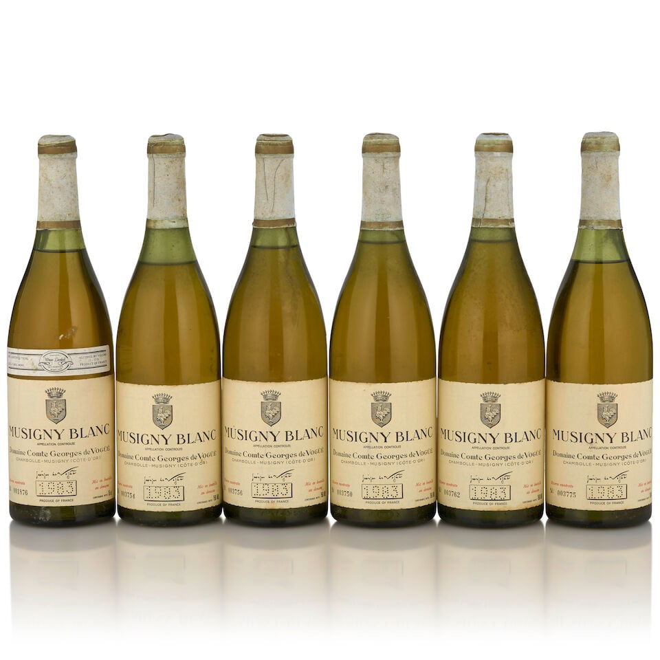 Domaine Comte Georges de Vogüé, Musigny Blanc, 1983 (6 bottles, 750ml): Domaine Comte Georges de Vogüé, Musigny Blanc, 1983 (6 bottles, 750ml) Region: Côte de Nuits Fill Level: two 1cm, two 1.5cm, two 2cm Capsule: heavily bin soiled Label: bin soiled Footno