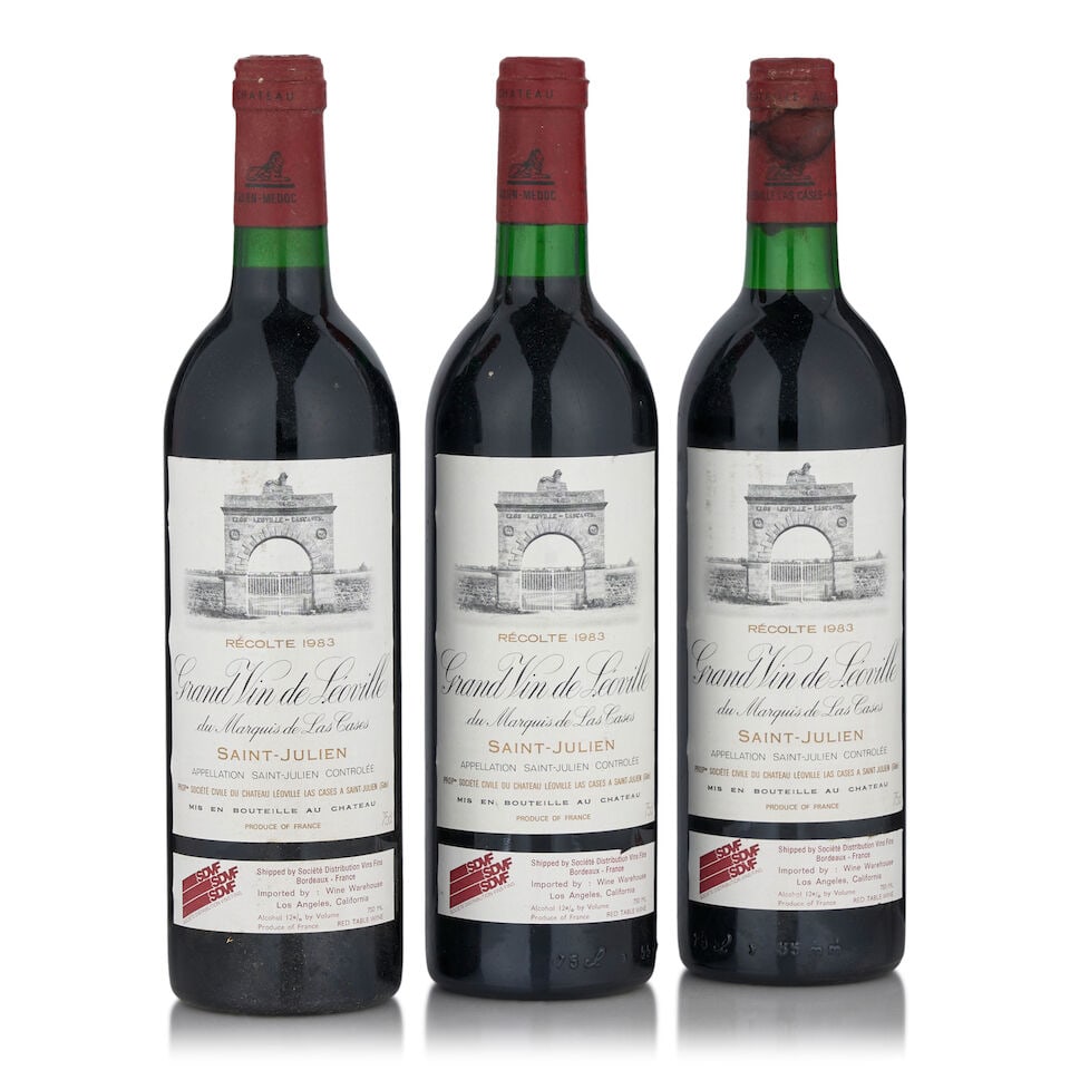 Château Léoville-Las Cases, 1983 (3 bottles, 750ml): Château Léoville-Las Cases, 1983 (3 bottles, 750ml) Region: Saint-Julien Fill Level: one into neck, two bottom neck Capsule: bin soiled, one heavily wine-stained Label: lightly bin marked Fo