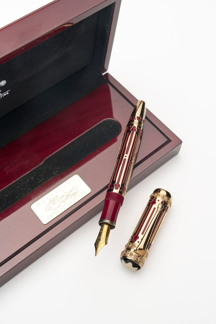 Montblanc | 'Catherine the Great' limited edition 'Patron of Art' fountain pen: Montblanc | 'Catherine the Great' limited edition 'Patron of Art' fountain pen Limited Edition No. 4552/4810 Cap/Barrel/Clip: aubergine coloured resin body adorns by pink vermile ornamentation overlay
