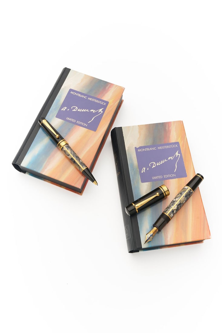 Montblanc | 'Alexandre Dumas' two limited edition 'Writers Series' writing instruments (2): Montblanc | 'Alexandre Dumas' two limited edition 'Writers Series' writing instruments Limited edition fountain pen 10477 / 20000, ballpoint pen 9764 / 16000; pen with marbled barrels, black resin cap