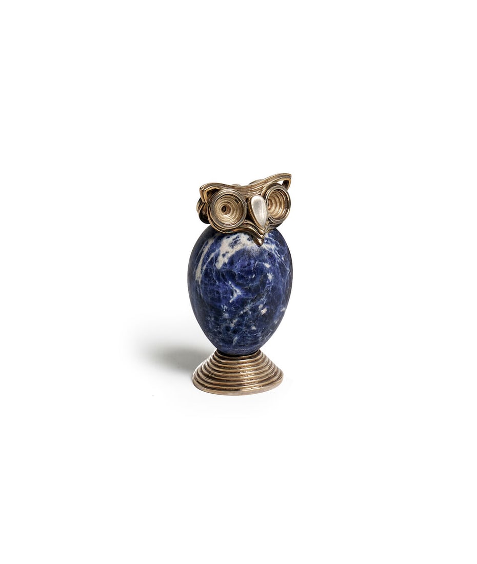 Ilias Lalaounis | Sodalite owl sculpture: Ilias Lalaounis | Sodalite owl sculpture The polished sodalite egg shaped body applied with sterling silver features, raised on a stepped circular foot, Ilias Lalaounis makers mark, 925 Greece A21, he