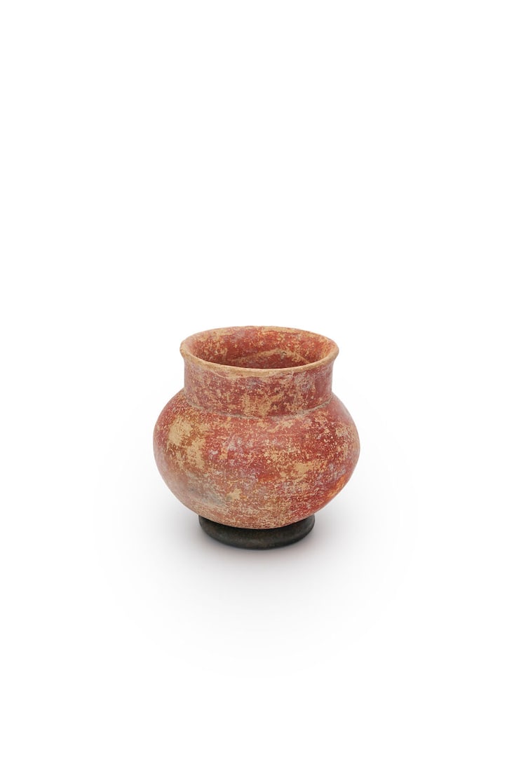 A Near Eastern pottery vessel possibly Iranian, height: 12.5cm including stand: A Near Eastern pottery vessel possibly Iranian, earthenware vessel with split ring iron stand, with David Jones Art Gallery, Sydney, label to base, height: 12.5cm including stand For further informati