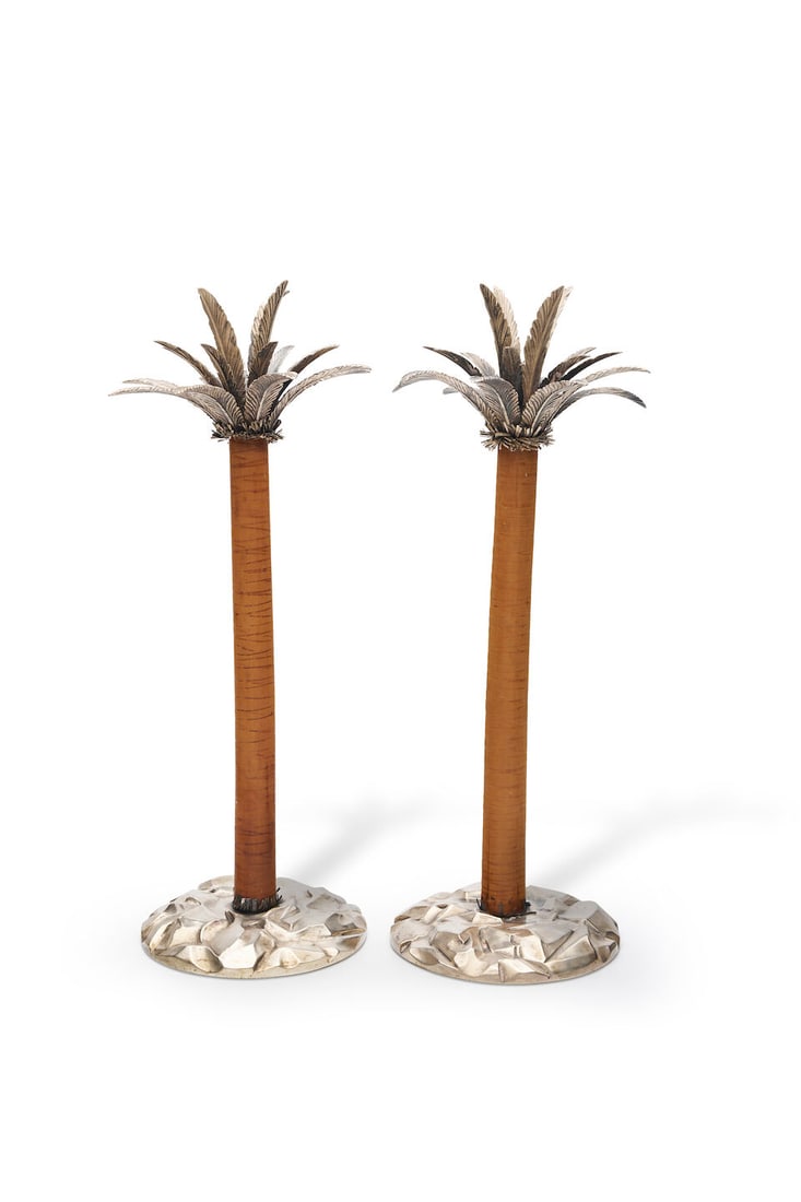 Calderoni Gioielli | pair of sterling silver candlesticks: Calderoni Gioielli | pair of sterling silver candlesticks designed as palm trees with sterling silver palms and base, composite trunk, signed Calderoni Gioielli, Italian registry mark, 925, height