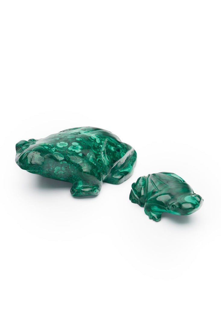 Two malachite frog figures: Two malachite frog figures one with Collezione Carlo Eleuteri stamp, measuring 14.0 x 10.7cm and 9.2 x 6.2cm. Footnotes: For further information on this lot please visit Bonhams.com For further inform