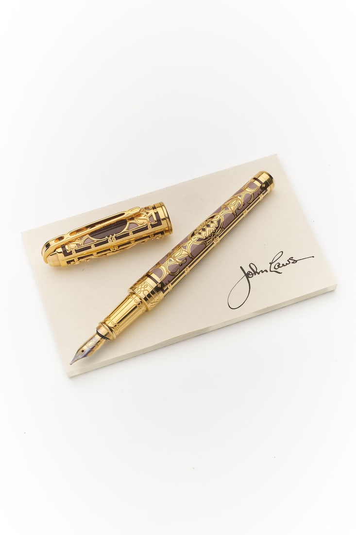 S.T. Dupont | Fine limited edition 'Olympio New York 5th Avenue' fountain pen: S.T. Dupont | Fine limited edition 'Olympio New York 5th Avenue' fountain pen Model: Olympio New York 5th Avenue, Limited Edition No. 0591 of 1929. Cap/Barrel/Clip: Gilded filigree and engraved patter