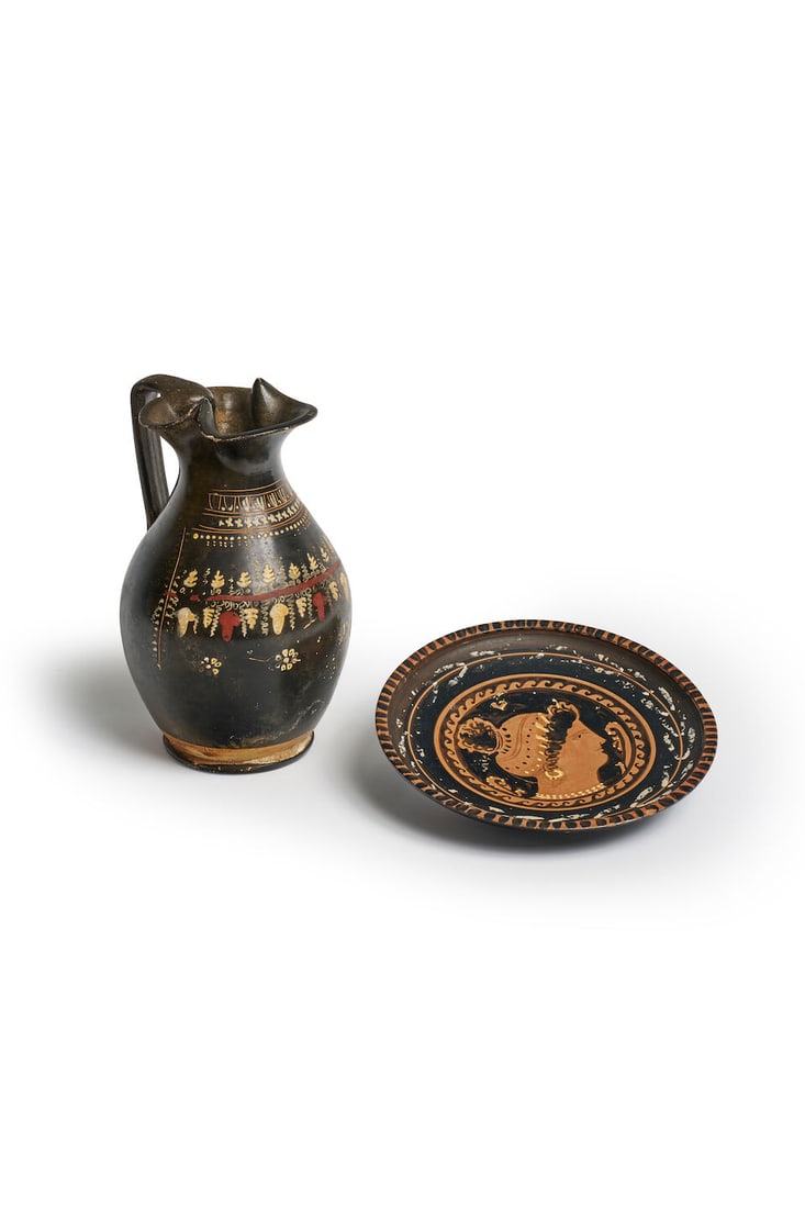 Two South Italian pottery vessels including an oinochoe and dish jug height: 20.5cm, dish width... (1 of 1)