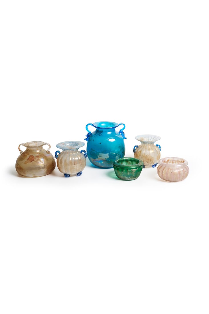 A group of five Murano glass amphora vases Venetian, 20th century (5): A group of five Murano glass amphora vases Venetian, 20th century Scavo glass with iridescent lustre, comprising a large blue amphora with applied handles, two opalescent amphora vases with blue glass