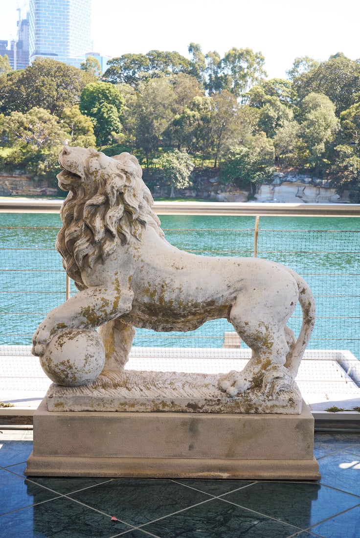 A pair of cast stone Medici lions, - 2