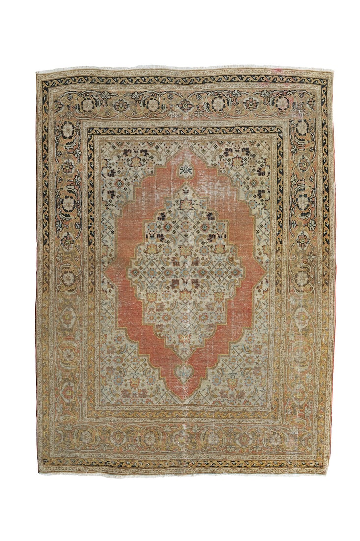 A Tabriz rug