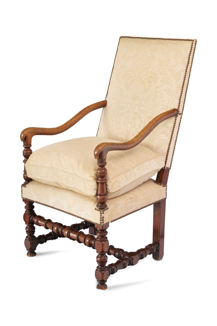An 18th century highbacked walnut armchair, Continental (1 of 2)
