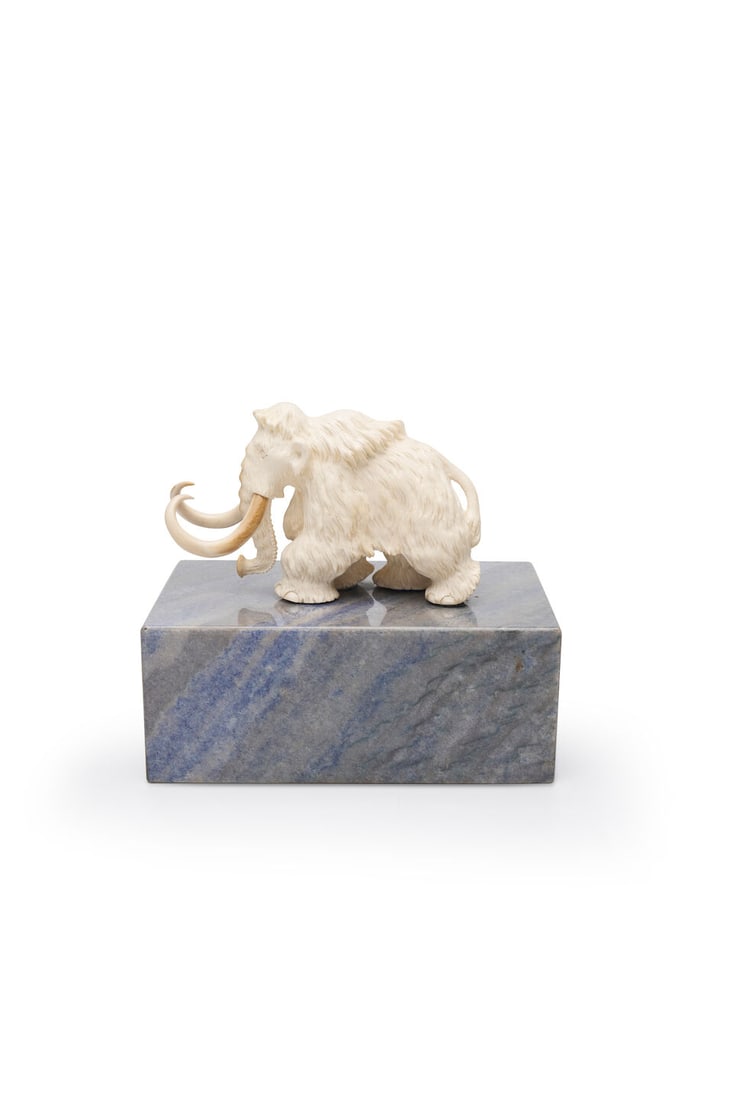 A Mammoth sculpture, 2011 by Svetlana Lebed height: 10.0cm excluding hardstone plinth by Svetlan...: A Mammoth sculpture, 2011 by Svetlana Lebed height: 10.0cm excluding hardstone plinth by Svetlana Lebed carved mammoth tusk height: 10.0cm excluding hardstone plinth Footnotes: Provenance Le Petite Op