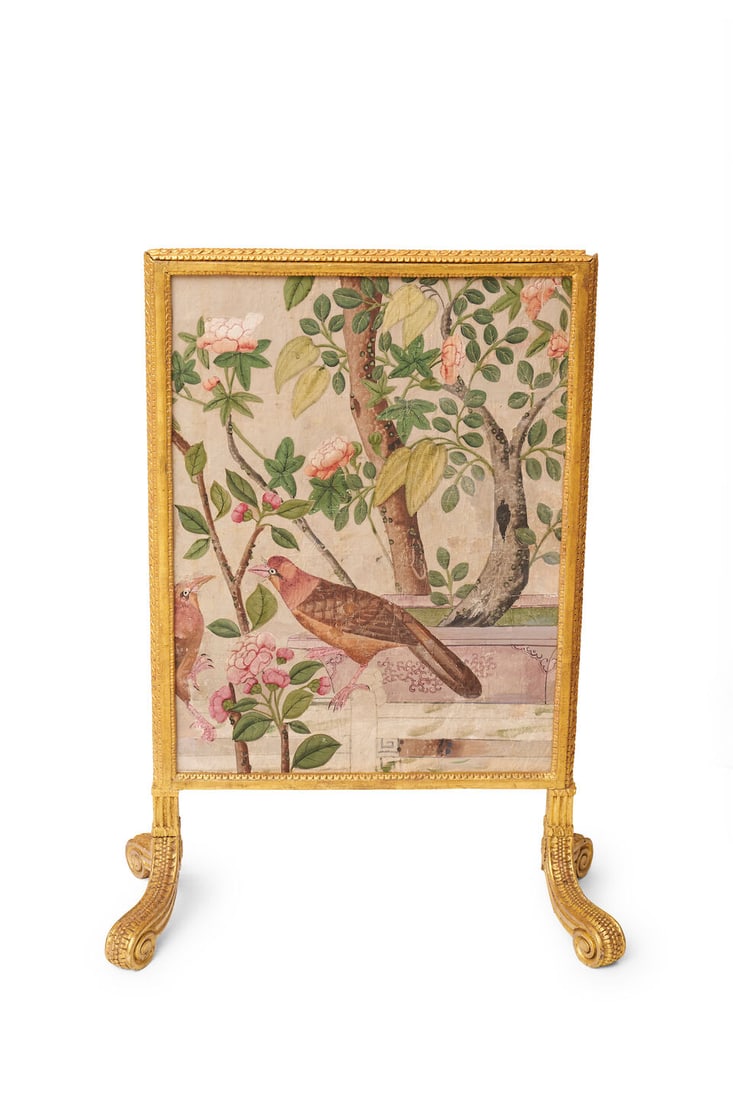 A Regency period giltwood fire screen,: A Regency period giltwood fire screen, set with panels of paper collage in gouache showing birds amongst exotic foliage and blossoms, 87.0 x 55.0cm (34 1/4 x 21 5/8in). This lot is subject to the foll