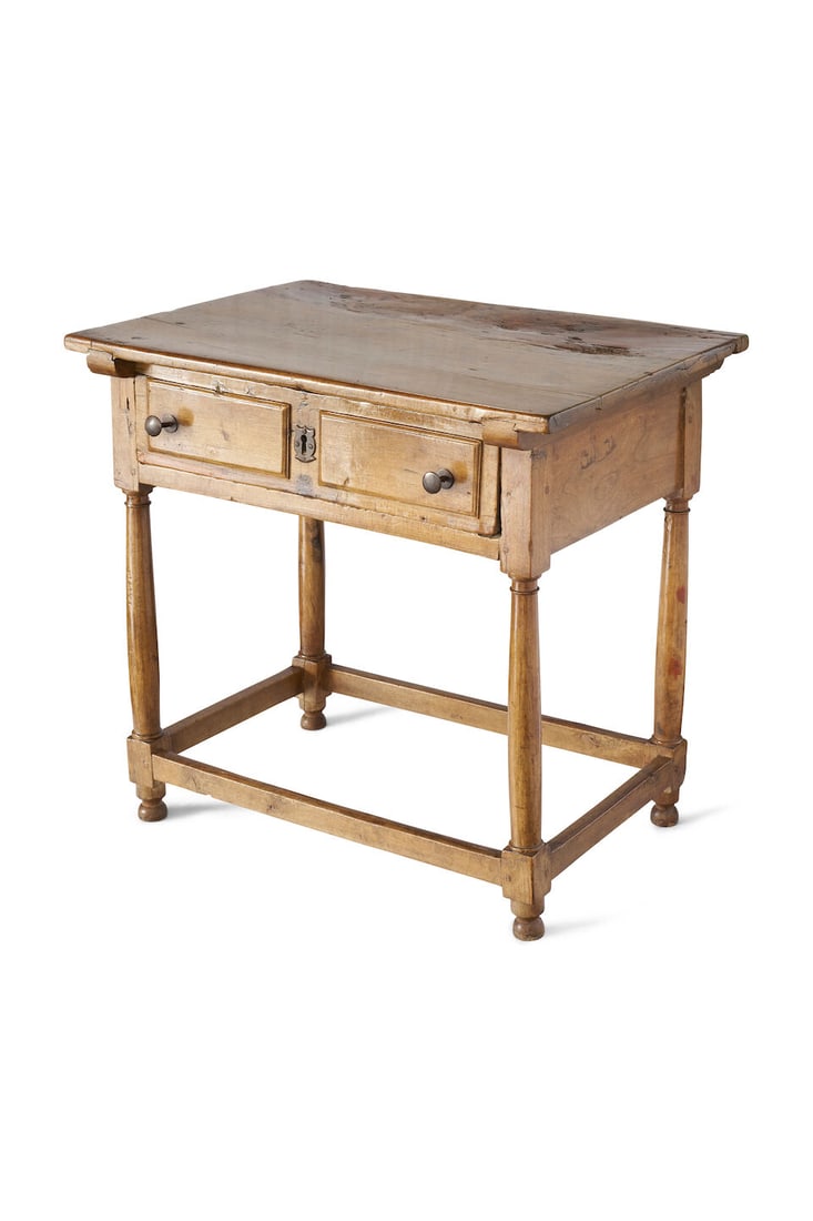 A provincial walnut side table, Continental, 18th century: A provincial walnut side table, Continental, 18th century rectangular top above a single frieze drawer with faux drawer fronts, on baluster turned legs joined by stretcher, height: 79.0cm, width: 83.5