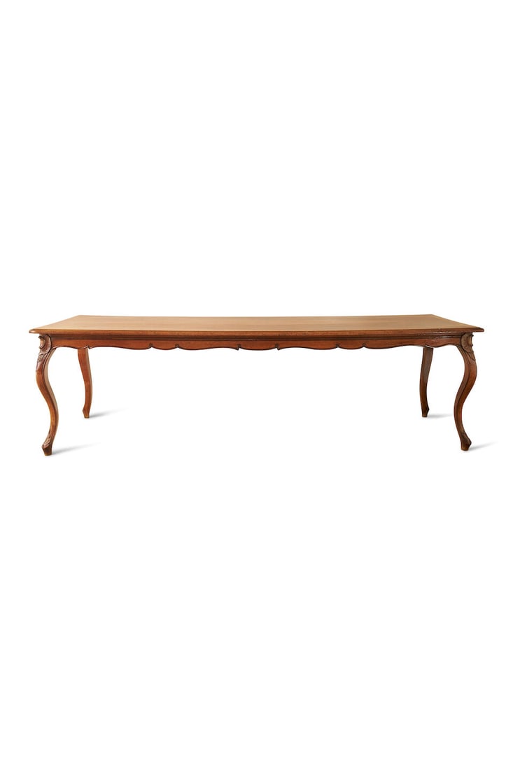 A Louis XV style walnut dining table, French, - 2
