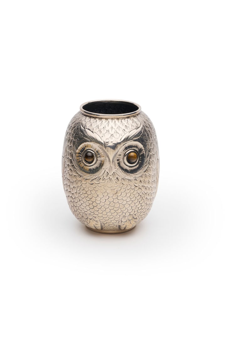 Fratelli Cacchione | An Italian silver figural vase marked F.C 925 STERLING, Milan, circa 1970: Fratelli Cacchione | An Italian silver figural vase marked F.C 925 STERLING, Milan, circa 1970 a large owl form vase, retailed by Gioielleria Nardi, Venice, label attached to base, height 14.0cm,