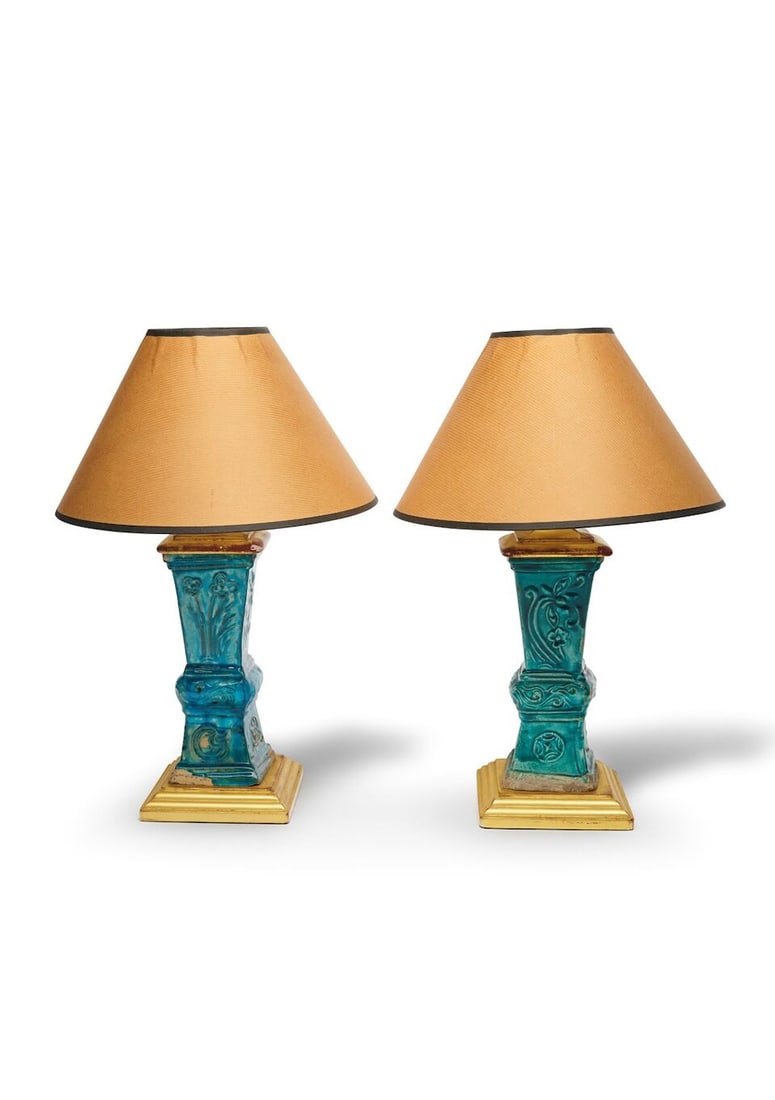 A pair of turquoise-glazed Fahua square altar garnitures as lamp stands China, 16th/17th century...: A pair of turquoise-glazed Fahua square altar garnitures as lamp stands China, 16th/17th century glazed ceramic with later stands, wired for electricity, height: 42.0cm including shade (2). For