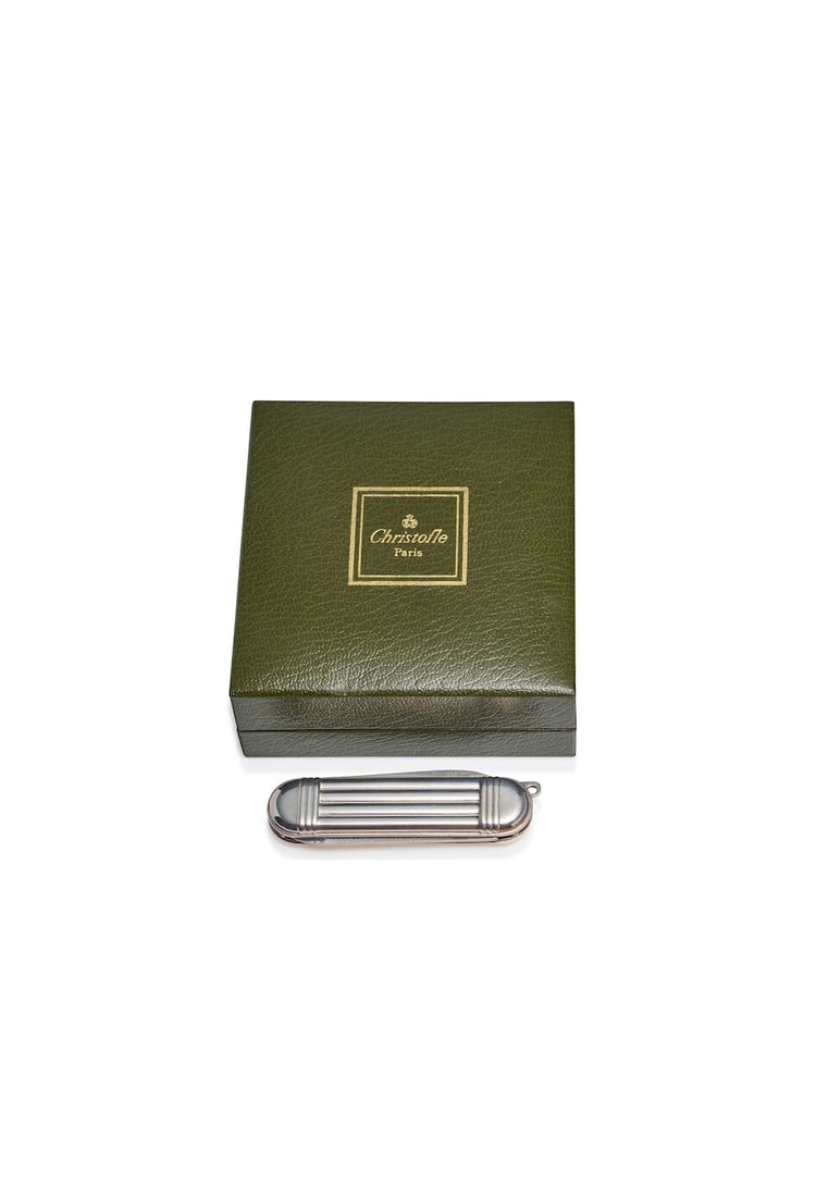 Christofle | Pocket knife, 20th century: Christofle | Pocket knife, 20th century The ribbed handle case concealing a single blade, in fitted maker's box, length closed 6.0cm, length extended 12.0cm, weight 65gms. For further information on t