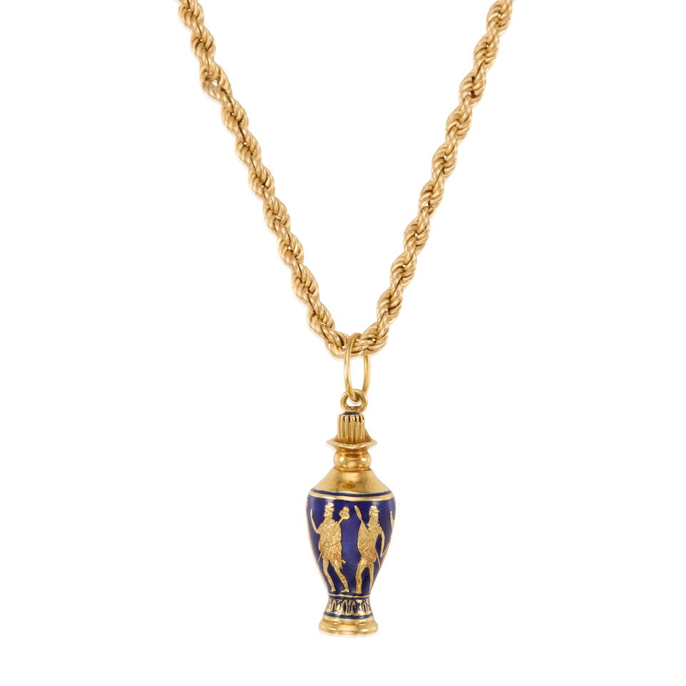 GOLD AND ENAMEL PENDANT NECKLACE: GOLD AND ENAMEL PENDANT NECKLACE • 14k gold chain, 18k gold pendant • Blue enamel accents, 1 round sapphire measuring approximately 3.35mm in diameter • Length 17 3/4 in., pendant