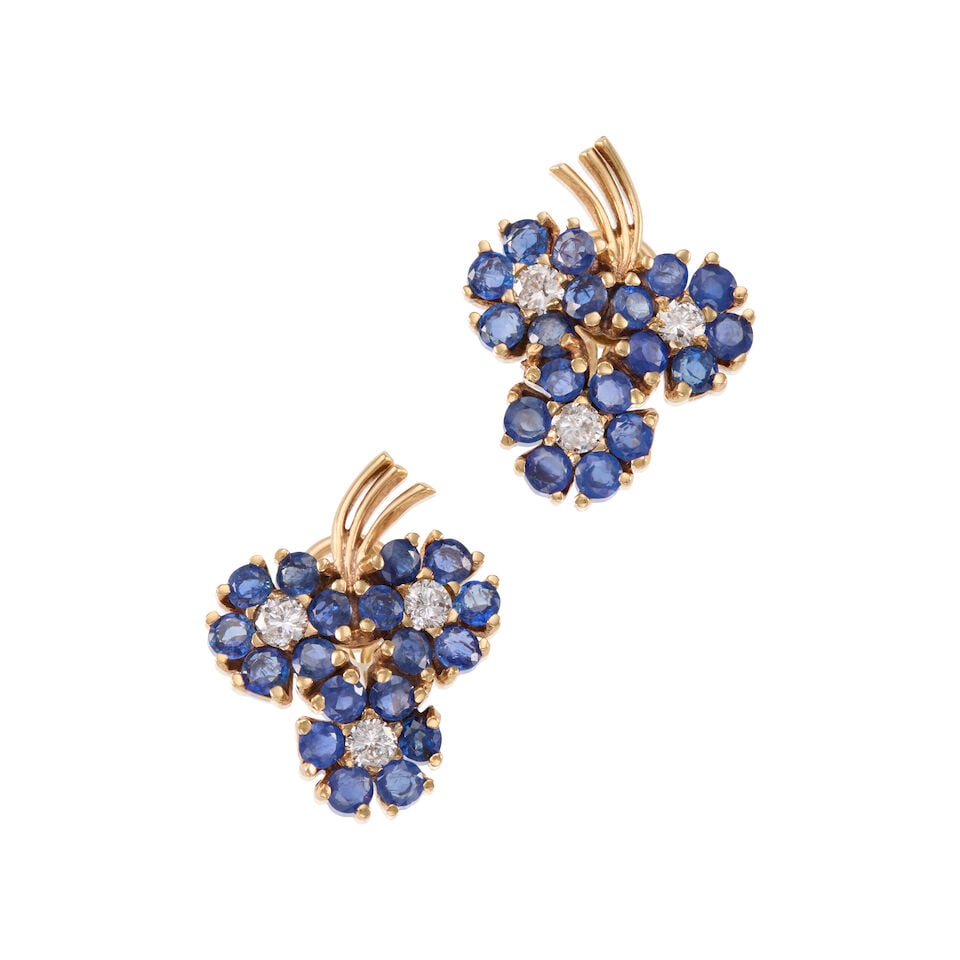 PAIR OF 12K GOLD, SAPPHIRE AND DIAMOND EARCLIPS: PAIR OF 12K GOLD, SAPPHIRE AND DIAMOND EARCLIPS • 12k yellow gold • Numerous round sapphires weighing approximately 6.90 - 7.20 carats total • 6 round diamonds weighing
