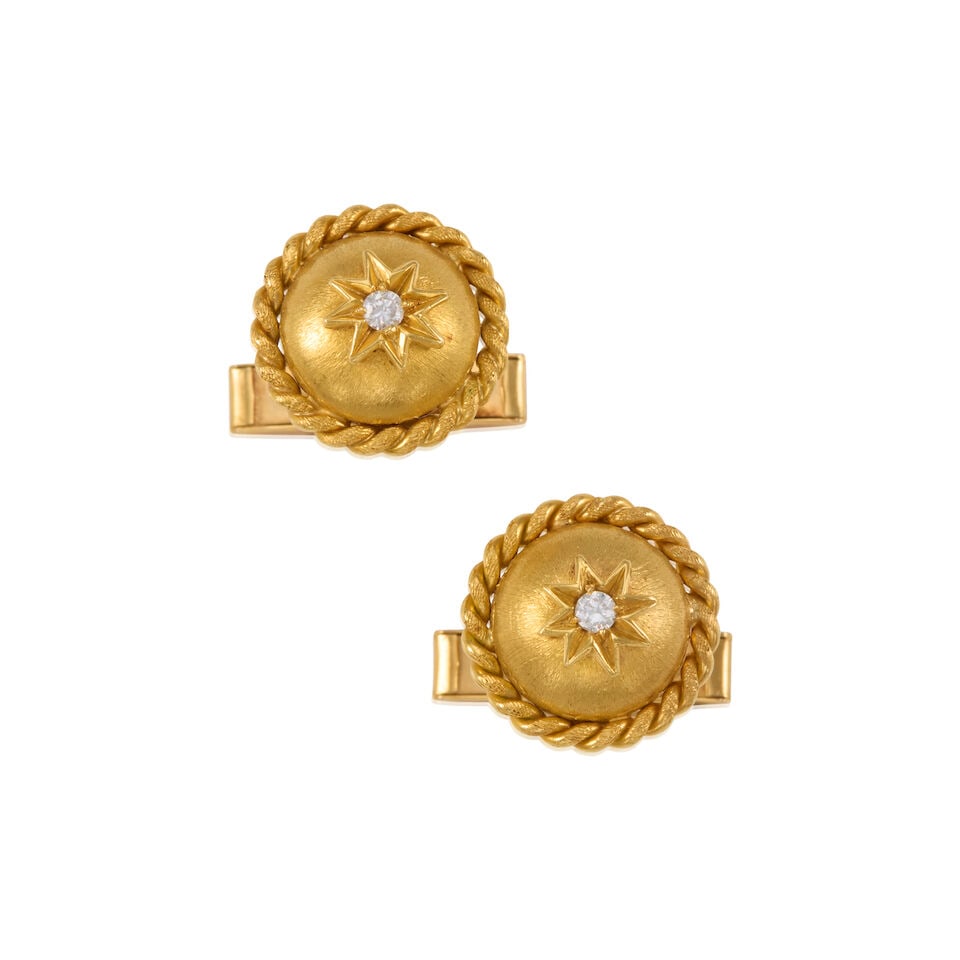 PAIR OF 14K GOLD AND DIAMOND CUFFLINKS: PAIR OF 14K GOLD AND DIAMOND CUFFLINKS • 14k yellow gold • 2 round diamonds weighing approximately 0.10 - 0.20 carat total • Measures 1 1/4 x 3/4 in. • Estimated gross weight: