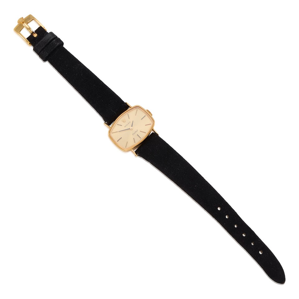 ROLEX: ORCHID WRISTWATCH: ROLEX: ORCHID WRISTWATCH • 18k yellow gold case and buckle • Dial, case and strap signed ROLEX • Manual movement • Case measures 23.49 mm • Case with Ref. number • 