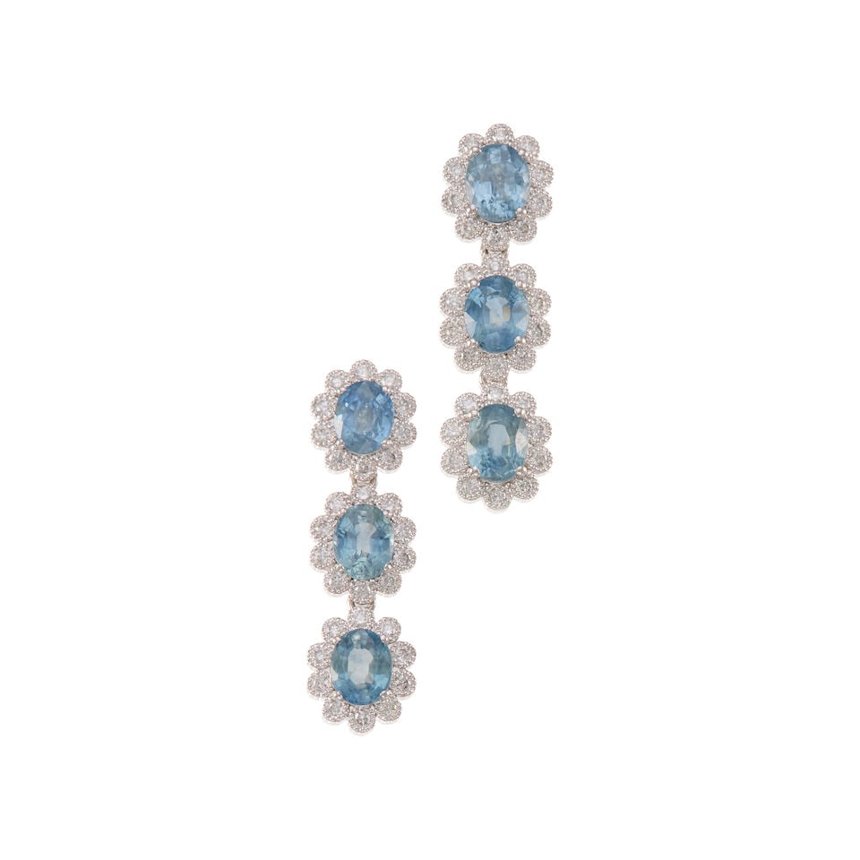 PLATINUM, SAPPHIRE, AND DIAMOND EARRINGS: PLATINUM, SAPPHIRE, AND DIAMOND EARRINGS • Platinum • Six oval shaped sapphires weighing approximately 1.80 carats total • Numerous round shaped diamonds weighing approximately 0.30