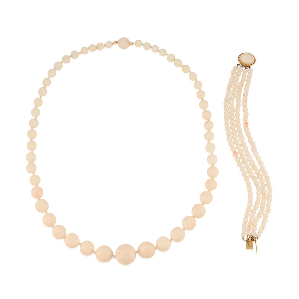 14K GOLD AND CORAL NECKLACE AND BRACELET: 14K GOLD AND CORAL NECKLACE AND BRACELET • One coral bead necklace with a 14K yellow gold clasp, beads measuring approximately 6.48mm to 16.54mm in diameter, length 20 1/4 in. • 14K yellow